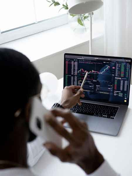 Person Reading Financial Articles